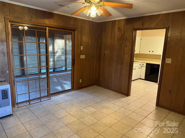 a view of an empty room and window