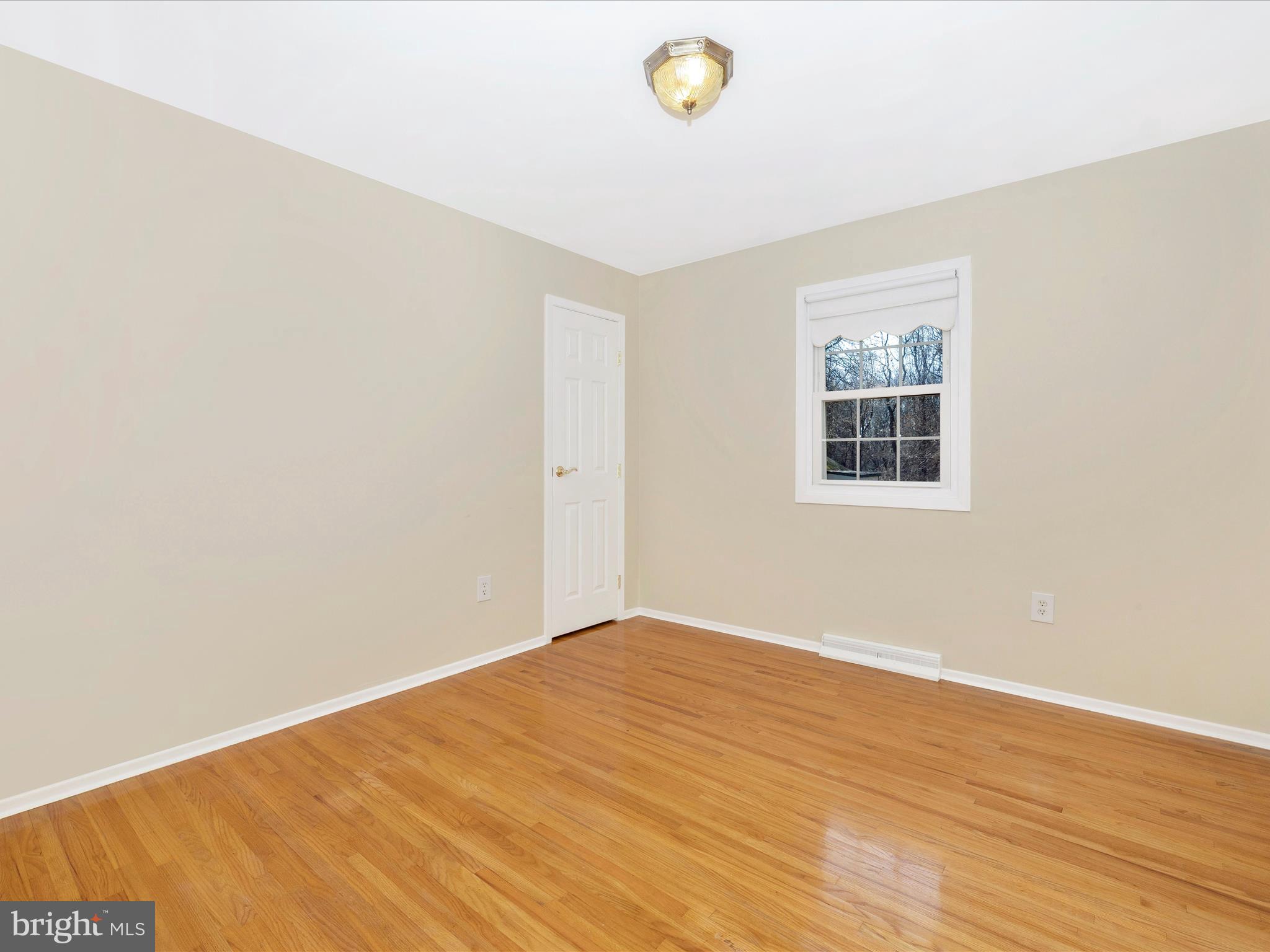 25204 Frederick Road Clarksburg, MD 20871 - Photo 32 of 58 an empty room with a window