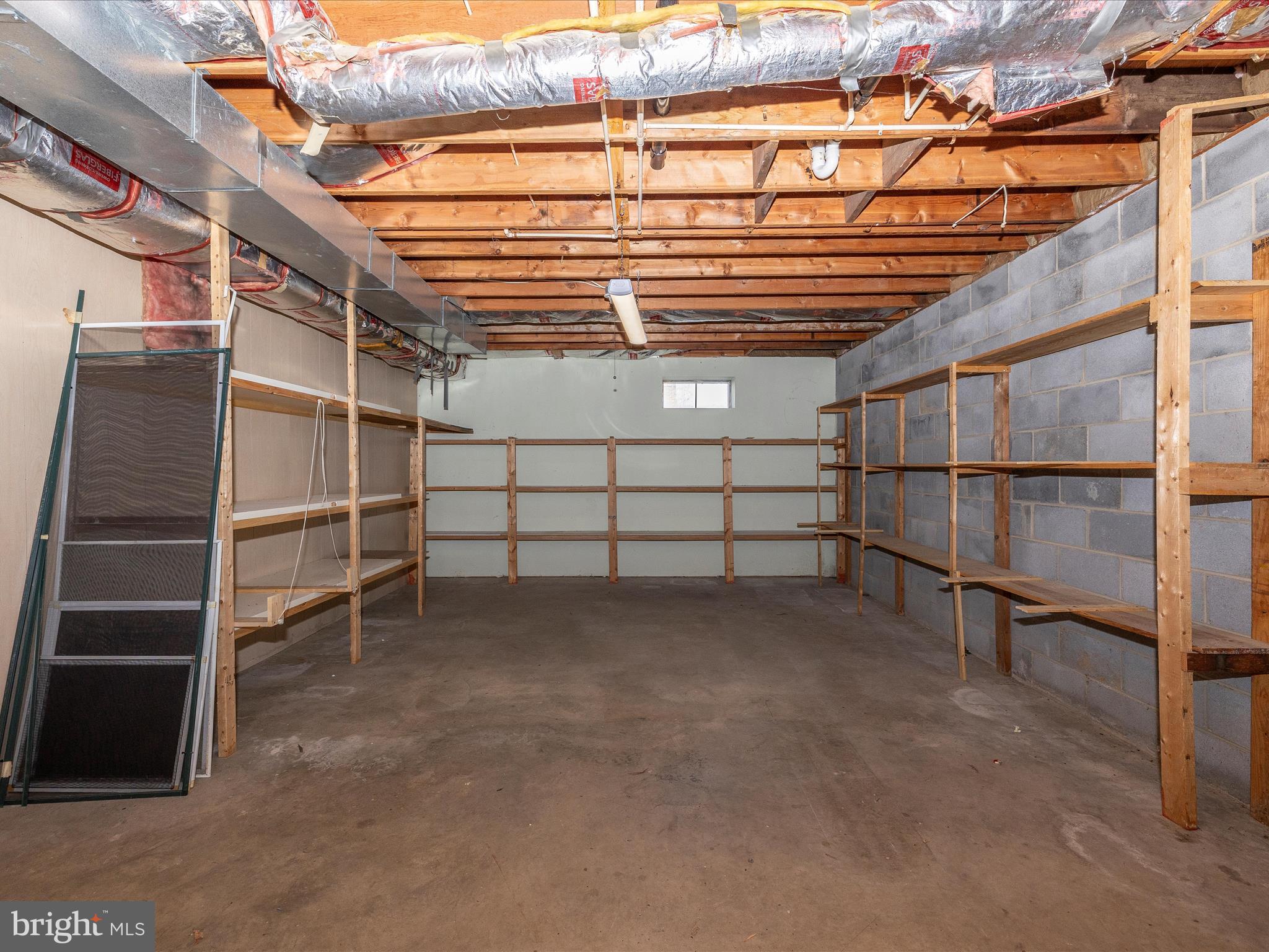 25204 Frederick Road Clarksburg, MD 20871 - Photo 44 of 58 a view of an empty room with a staircase