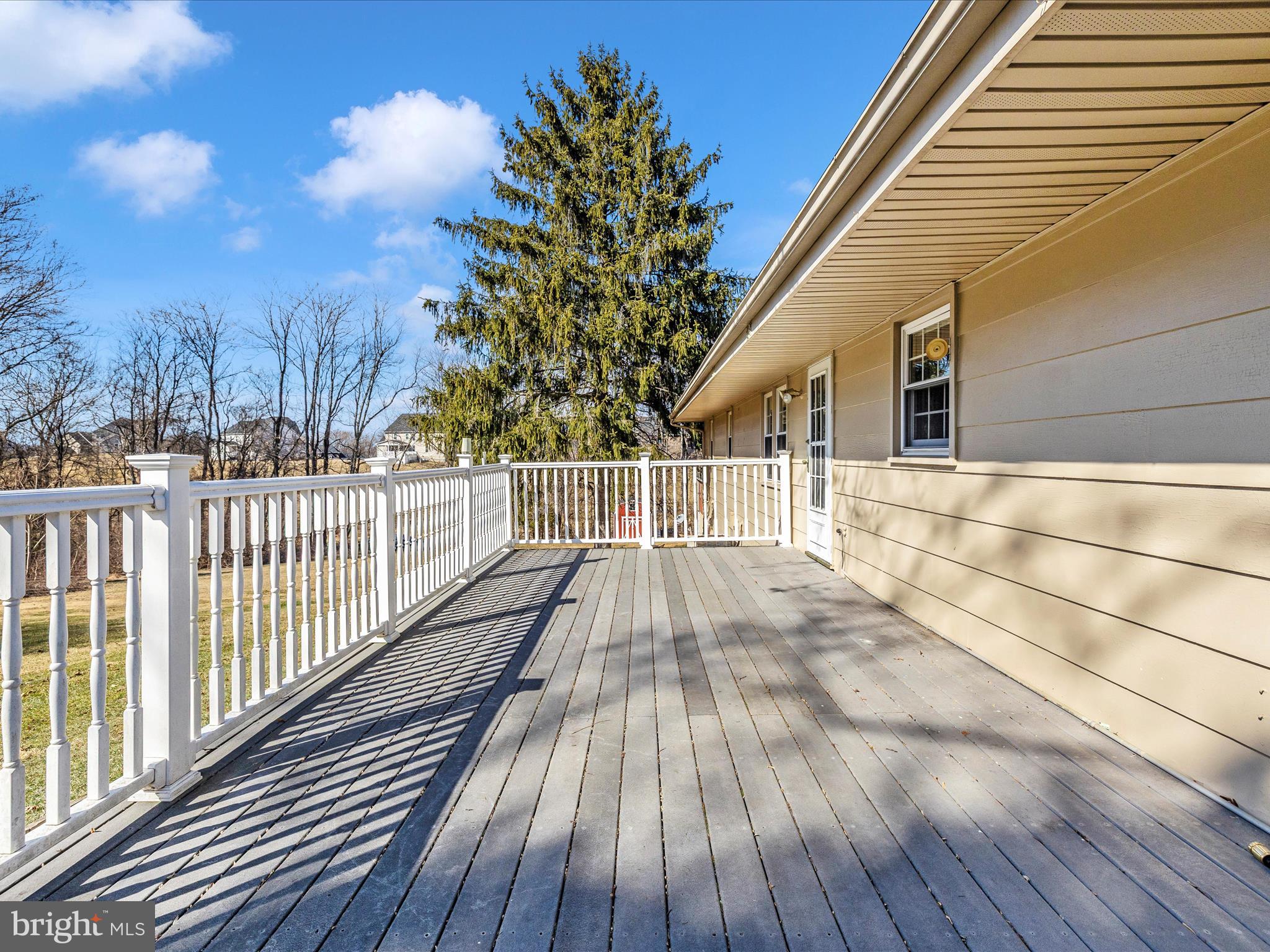 25204 Frederick Road Clarksburg, MD 20871 - Photo 51 of 58 a view of house with wooden floor and fence