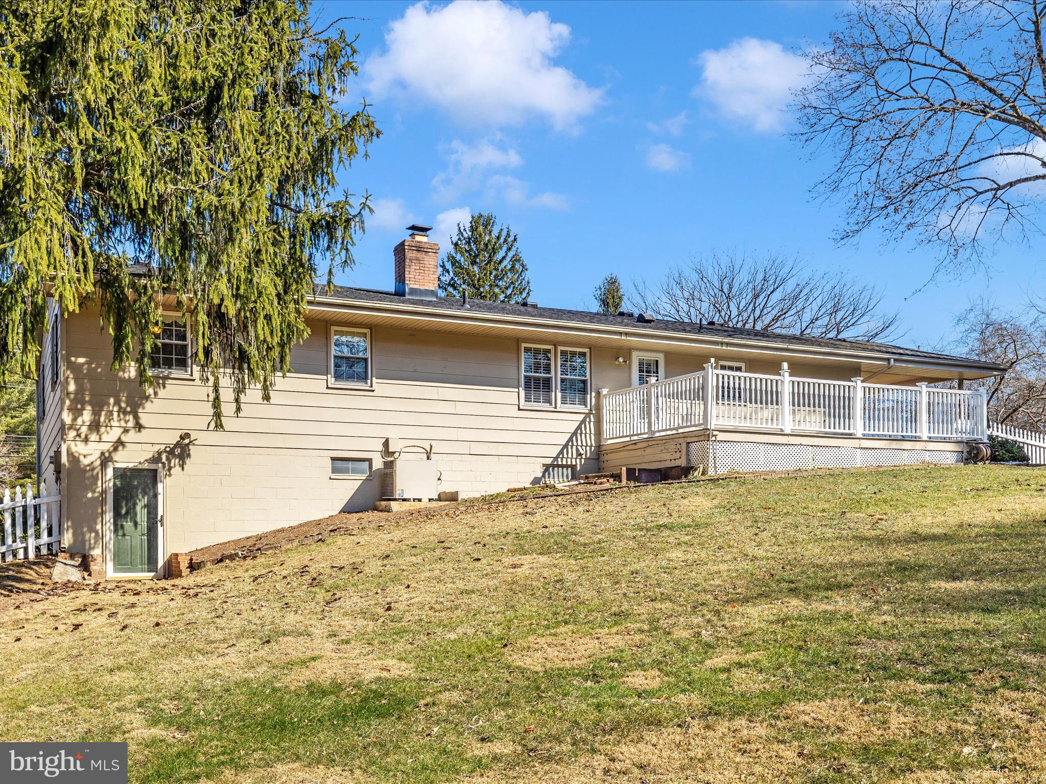 25204 Frederick Road Clarksburg, MD 20871 - Photo 54 of 58 a view of a house with a large tree
