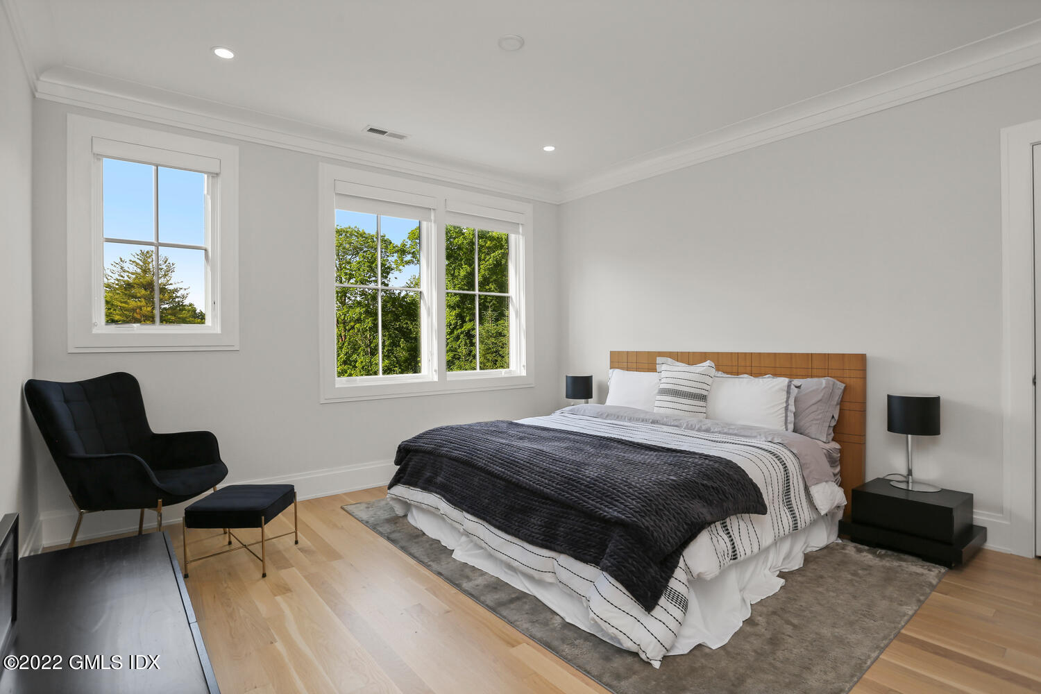 11 Turner Drive Greenwich, CT 06831 - Photo 20 of 35 a bedroom with a bed and a window