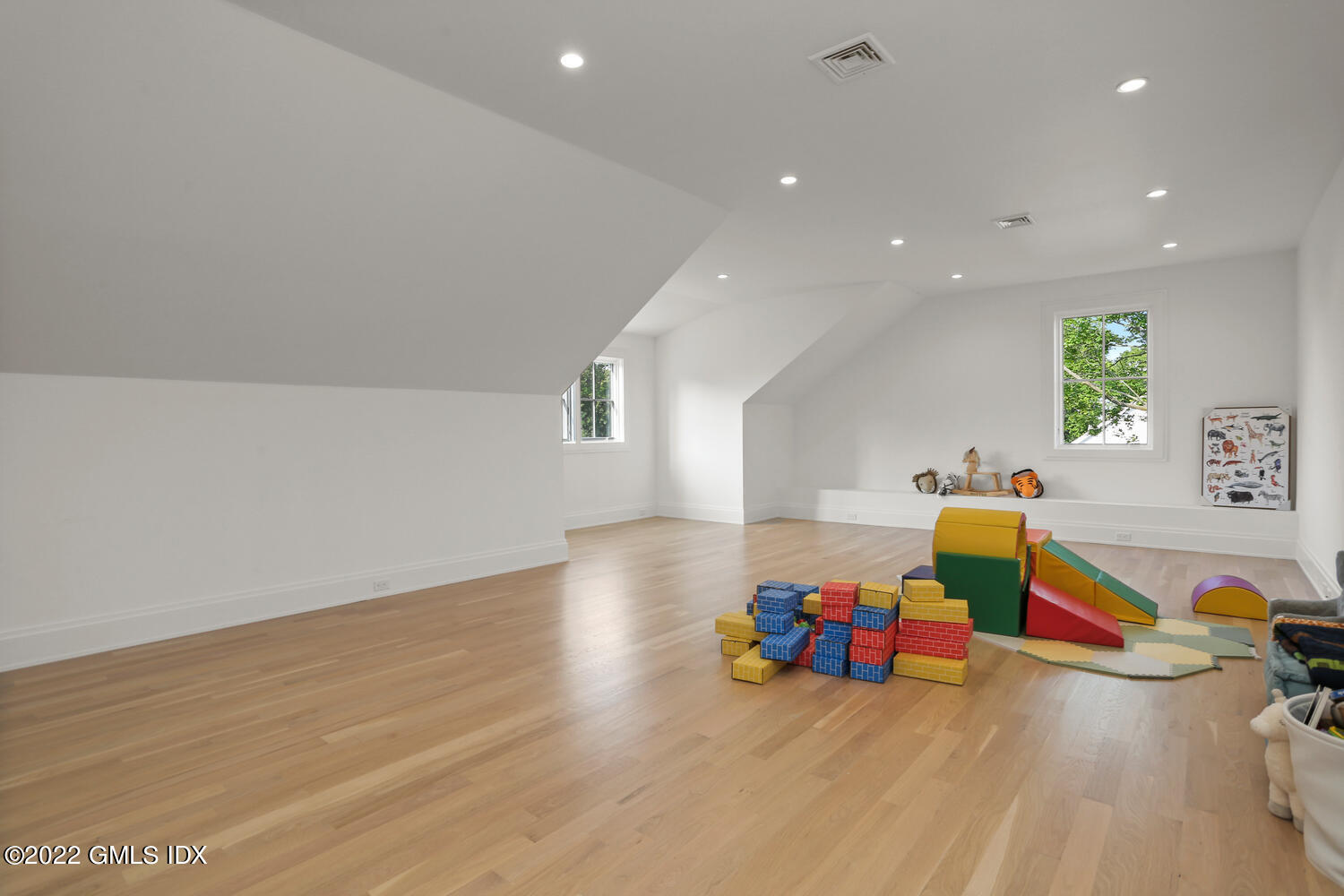 11 Turner Drive Greenwich, CT 06831 - Photo 24 of 35 a view of a big room with wooden floor and furniture