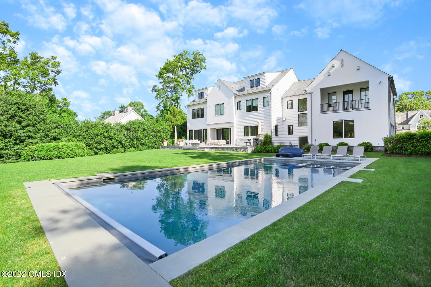 11 Turner Drive Greenwich, CT 06831 - Photo 31 of 35 a view of a house with a yard