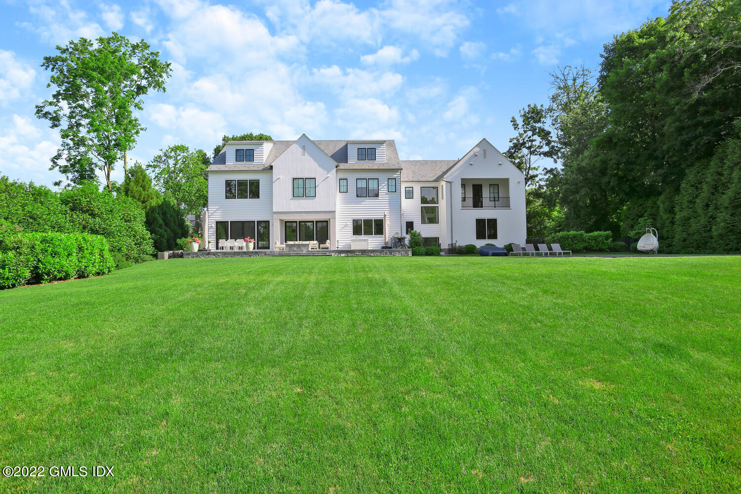 11 Turner Drive Greenwich, CT 06831 - Photo 34 of 35 a view of a house with a big yard and large trees