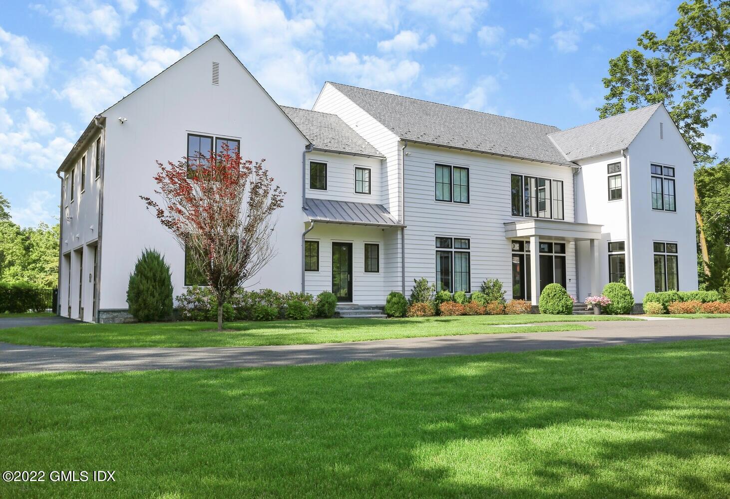11 Turner Drive Greenwich, CT 06831 - Photo 35 of 35 a front view of a house with a yard
