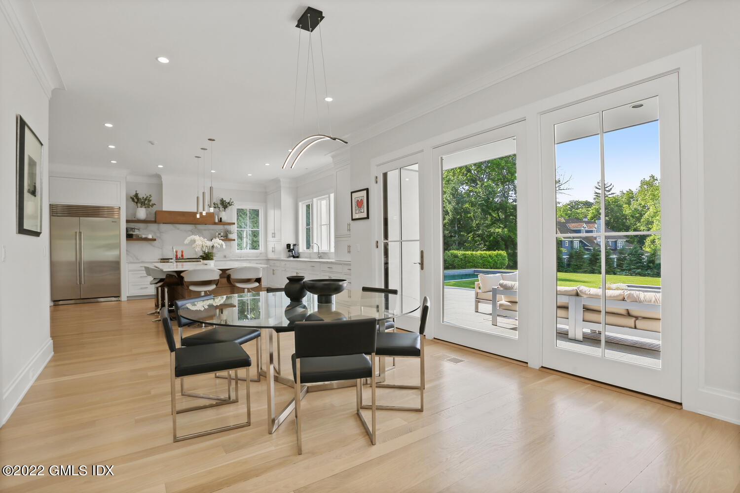 11 Turner Drive Greenwich, CT 06831 - Photo 6 of 35 a dining room with furniture and a large window