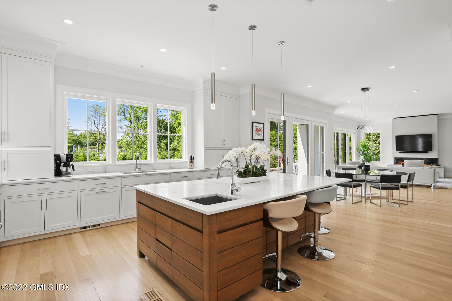 11 Turner Drive Greenwich, CT 06831 - Photo 9 of 35 a kitchen with a sink stove and cabinets