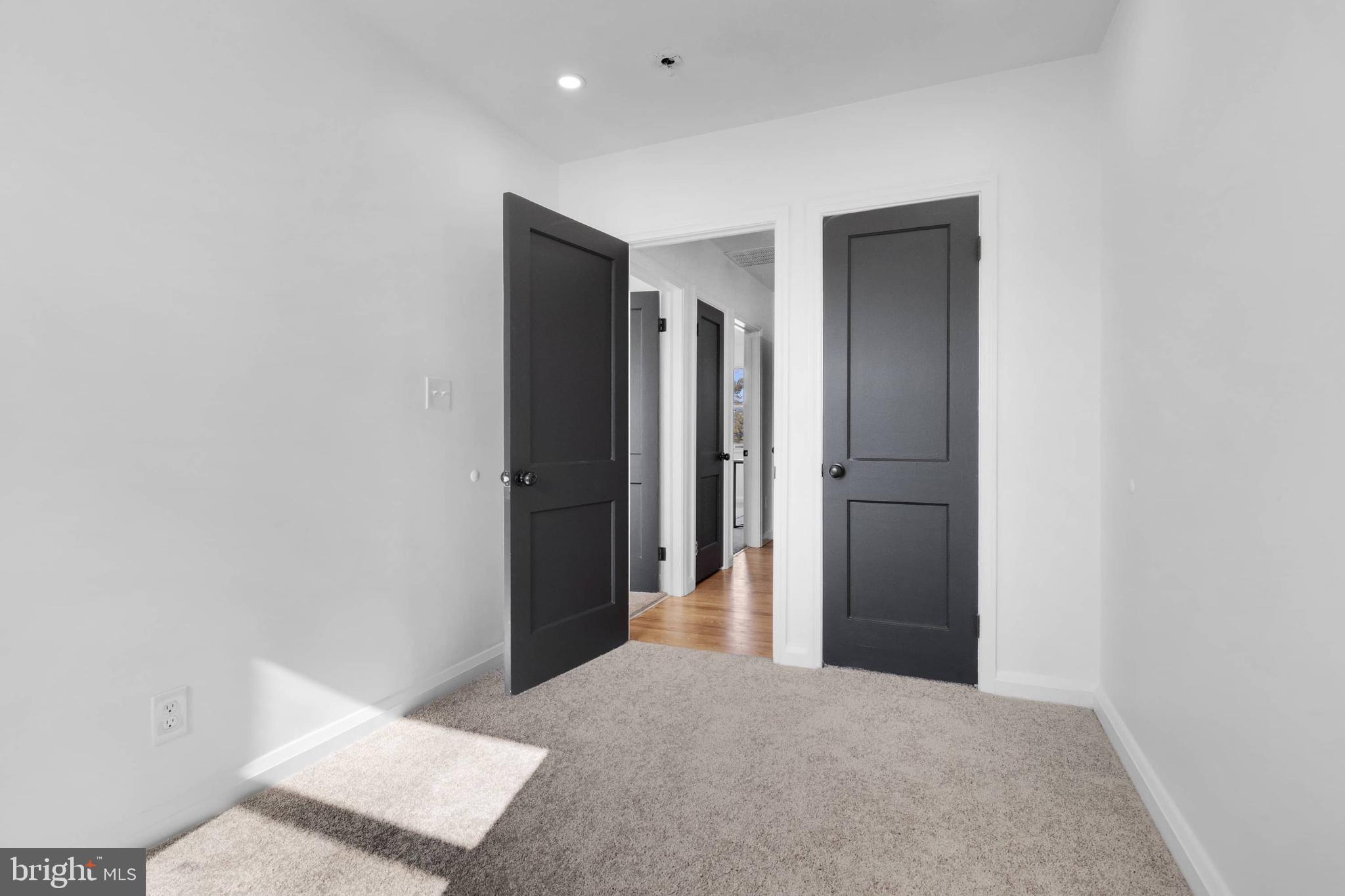 1403 Stonewood Road Baltimore, MD 21239 - Photo 27 of 36 a view of hallway with closet and bathroom