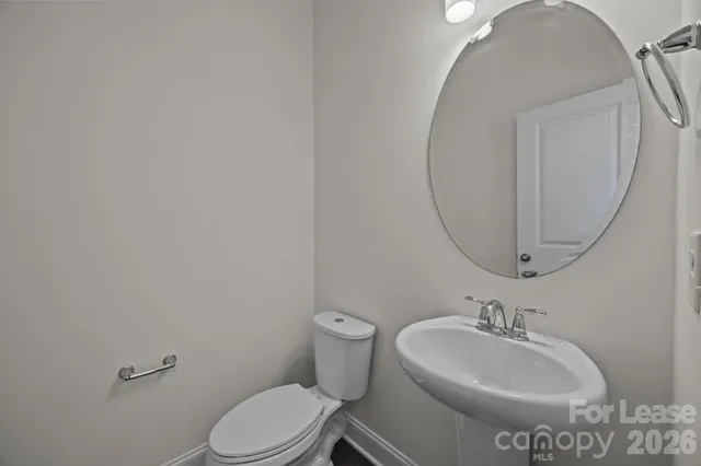 an empty room with a bathroom