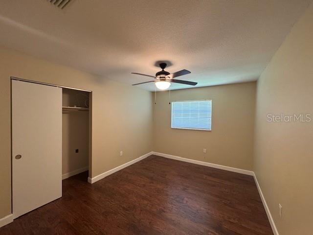 4825 Kimball Court East Lakeland, FL 33813 - Photo 14 of 26 a view of empty room with wooden floor