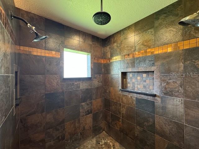 4825 Kimball Court East Lakeland, FL 33813 - Photo 20 of 26 a bathroom with a shower