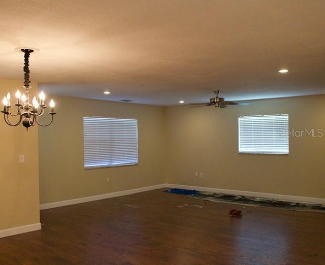 4825 Kimball Court East Lakeland, FL 33813 - Photo 6 of 26 a view of empty room with wooden floor