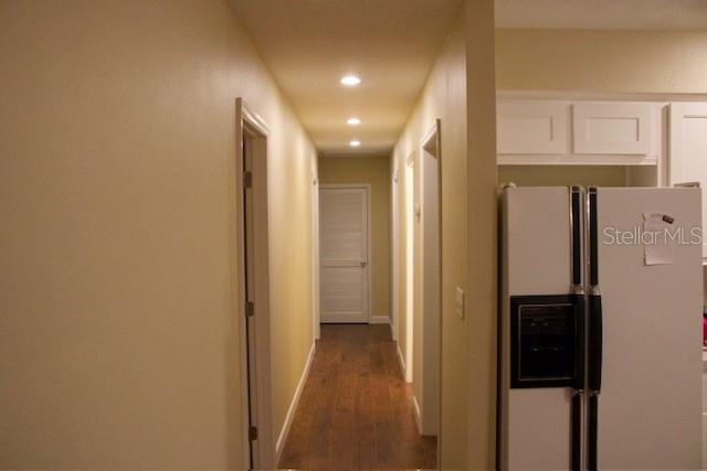 4825 Kimball Court East Lakeland, FL 33813 - Photo 8 of 26 a view of hallway with wooden floor