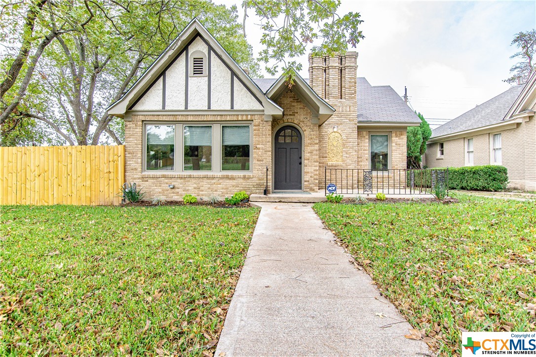 1419 North 5th Street Temple, TX 76501 - Photo 1 of 1 a front view of a house with a yard and fence