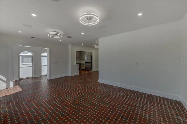 a view of a kitchen from the hallway