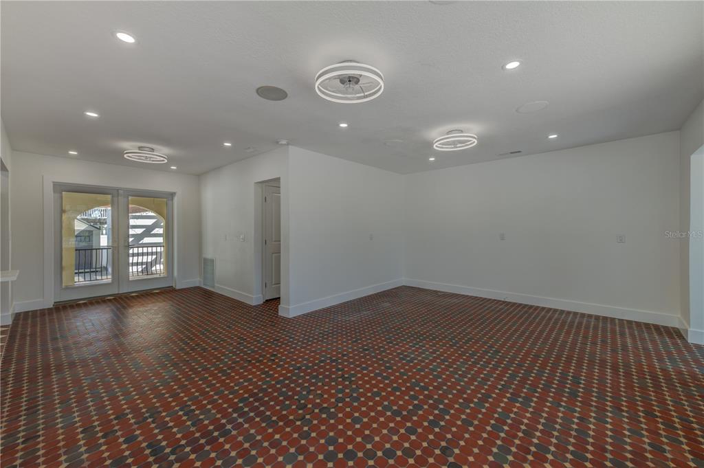 16245 Gulf Boulevard Redington Beach, FL 33708 - Photo 17 of 30 a view of an empty room with wooden floor and a window