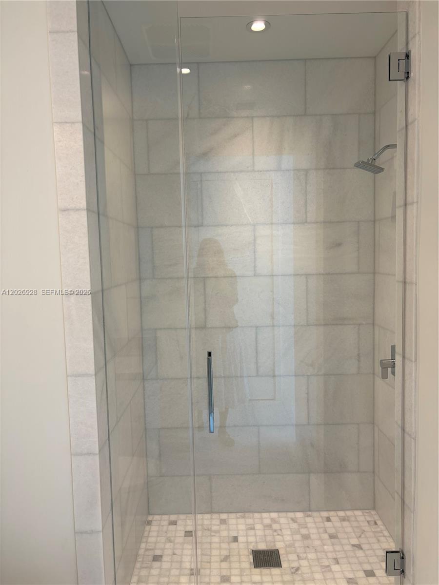 175 Southeast 25th Road, Unit 901 Miami, FL 33129 - Photo 13 of 18 a bathroom with a shower