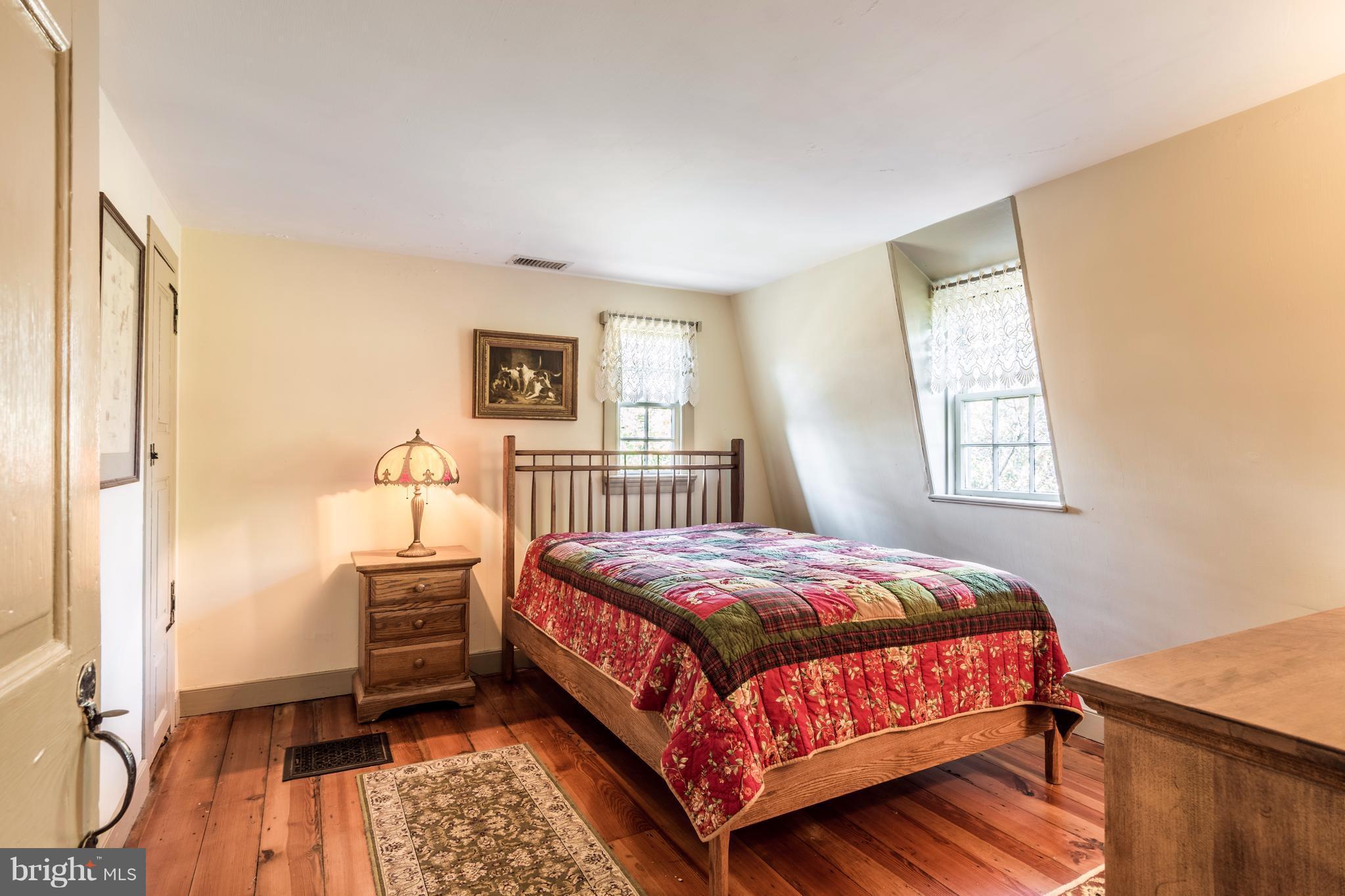 1625 Peters Corner Road Marydel, MD 21649 - Photo 14 of 30 a bedroom with a bed and a window