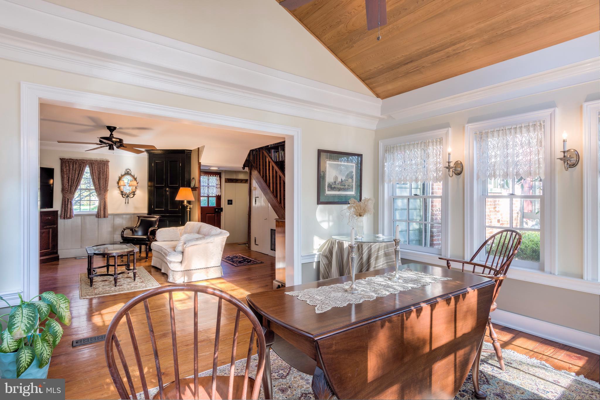 1625 Peters Corner Road Marydel, MD 21649 - Photo 7 of 30 a view of a dining room with furniture window and wooden floor