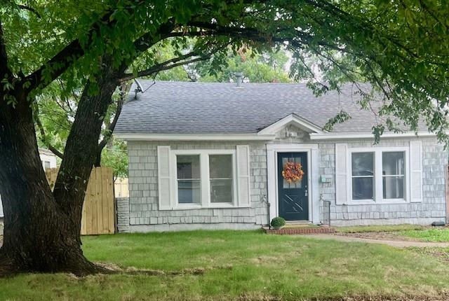 308 North Retta Street Fort Worth, TX 76111 - Photo 1 of 24 a view of a house with a yard