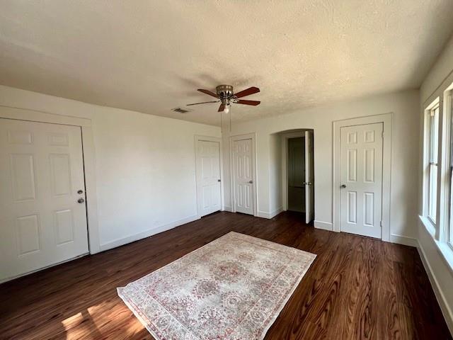 308 North Retta Street Fort Worth, TX 76111 - Photo 17 of 24 wooden floor in an empty room with a window