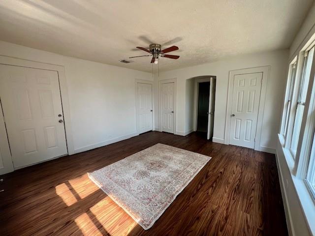 308 North Retta Street Fort Worth, TX 76111 - Photo 20 of 24 wooden floor in an empty room with a window
