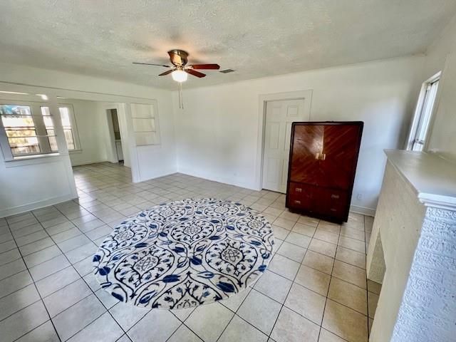308 North Retta Street Fort Worth, TX 76111 - Photo 5 of 24 a living room with a large mirror and a rug