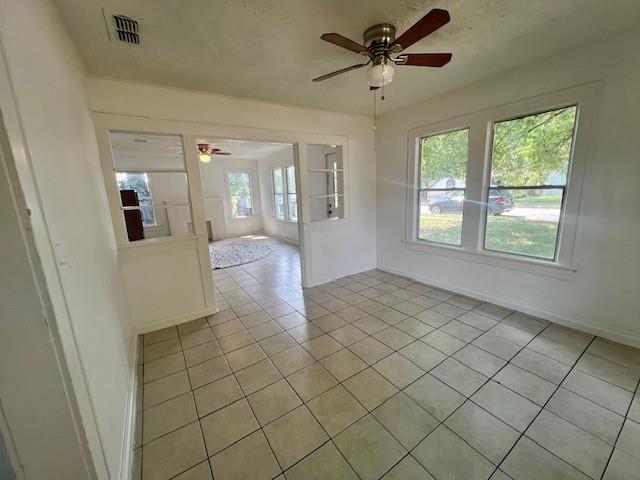 308 North Retta Street Fort Worth, TX 76111 - Photo 7 of 24 a view of an empty room and window