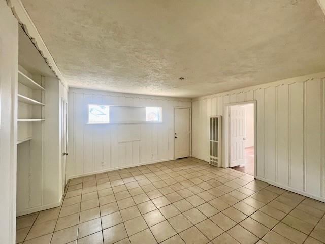 308 North Retta Street Fort Worth, TX 76111 - Photo 9 of 24 a view of an empty room and window