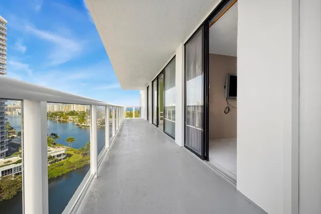 a view of hallway with livingroom