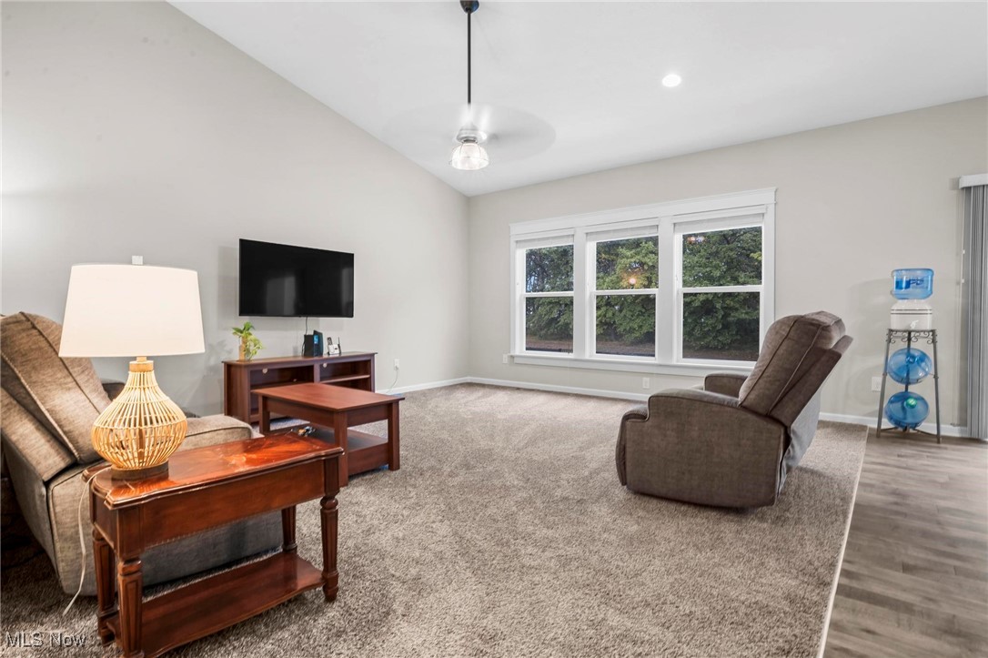 6824 Hatching Way North Ridgeville, OH 44039 - Photo 11 of 42 Living room with hardwood / wood-style floors, ceiling fan, and lofted ceiling