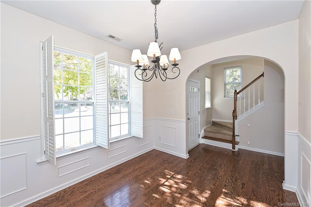 642 Brickdust Court Fort Mill, SC 29708 - Photo 2 of 24 a view of a livingroom with wooden floor stairs