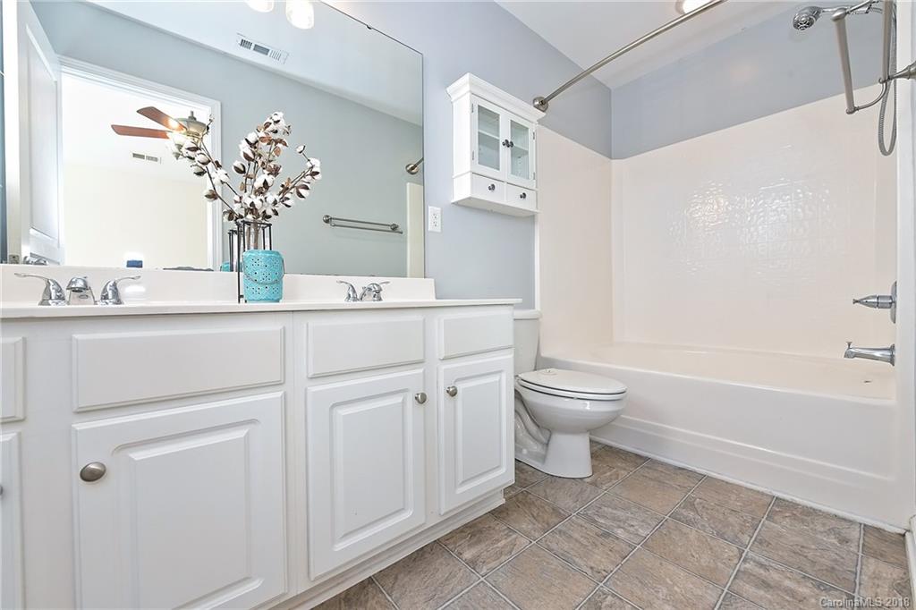 642 Brickdust Court Fort Mill, SC 29708 - Photo 16 of 24 a bathroom with a toilet sink and a bath tub
