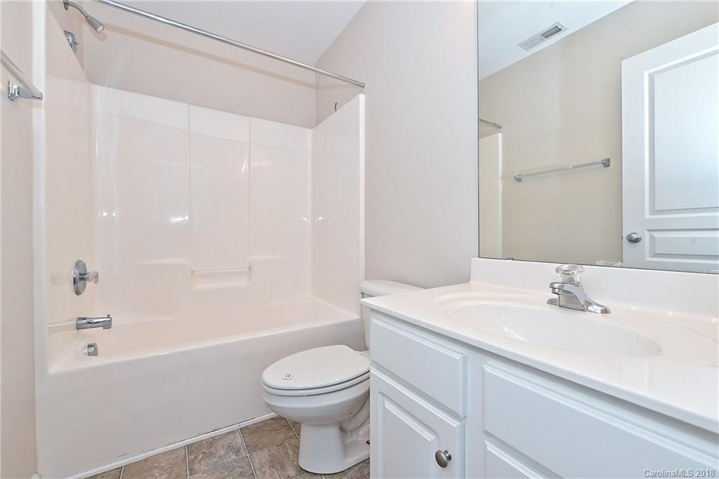 642 Brickdust Court Fort Mill, SC 29708 - Photo 20 of 24 a bathroom with a sink a toilet and shower