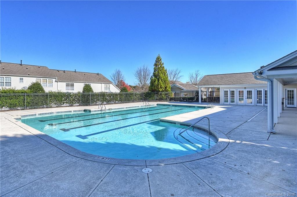 642 Brickdust Court Fort Mill, SC 29708 - Photo 24 of 24 a view of a swimming pool with a terrace