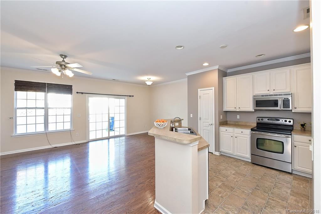 642 Brickdust Court Fort Mill, SC 29708 - Photo 8 of 24 a view of a kitchen with microwave and stove