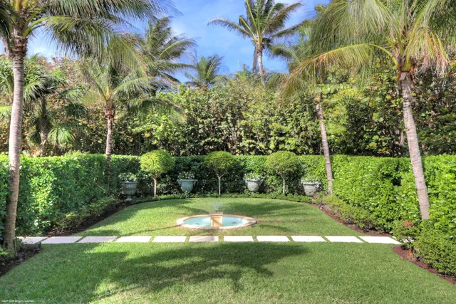a view of a backyard with a garden