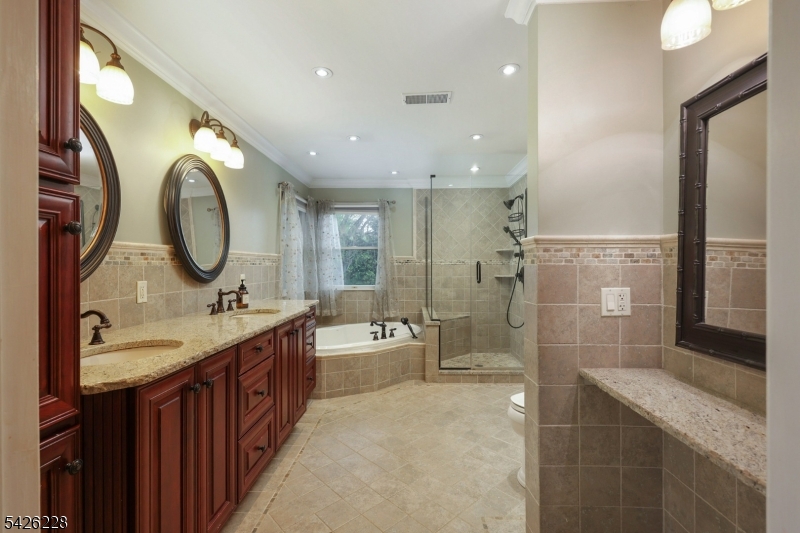 5 Gordon Place Bernards, NJ 07920 - Photo 14 of 30 a bathroom with a double vanity sink mirror and shower