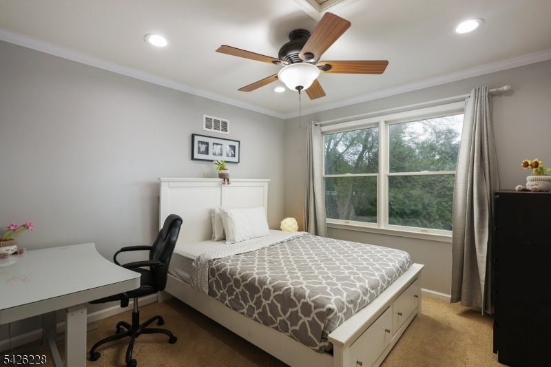 5 Gordon Place Bernards, NJ 07920 - Photo 15 of 30 a bedroom with a bed and a window