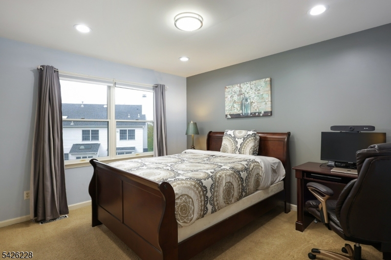 5 Gordon Place Bernards, NJ 07920 - Photo 16 of 30 a bedroom with a bed and a window
