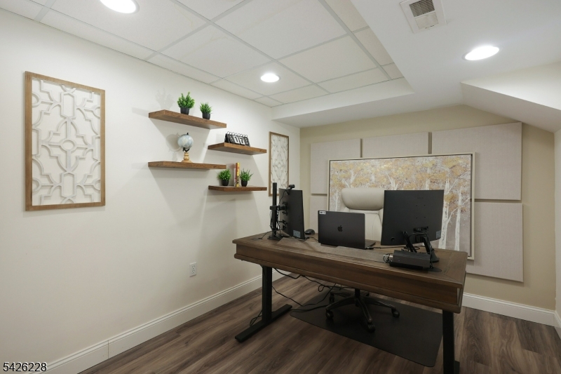 5 Gordon Place Bernards, NJ 07920 - Photo 22 of 30 a view of a workspace with furniture and wooden floor
