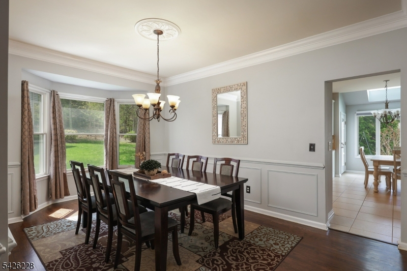 5 Gordon Place Bernards, NJ 07920 - Photo 4 of 30 a view of a dining room with furniture window and wooden floor