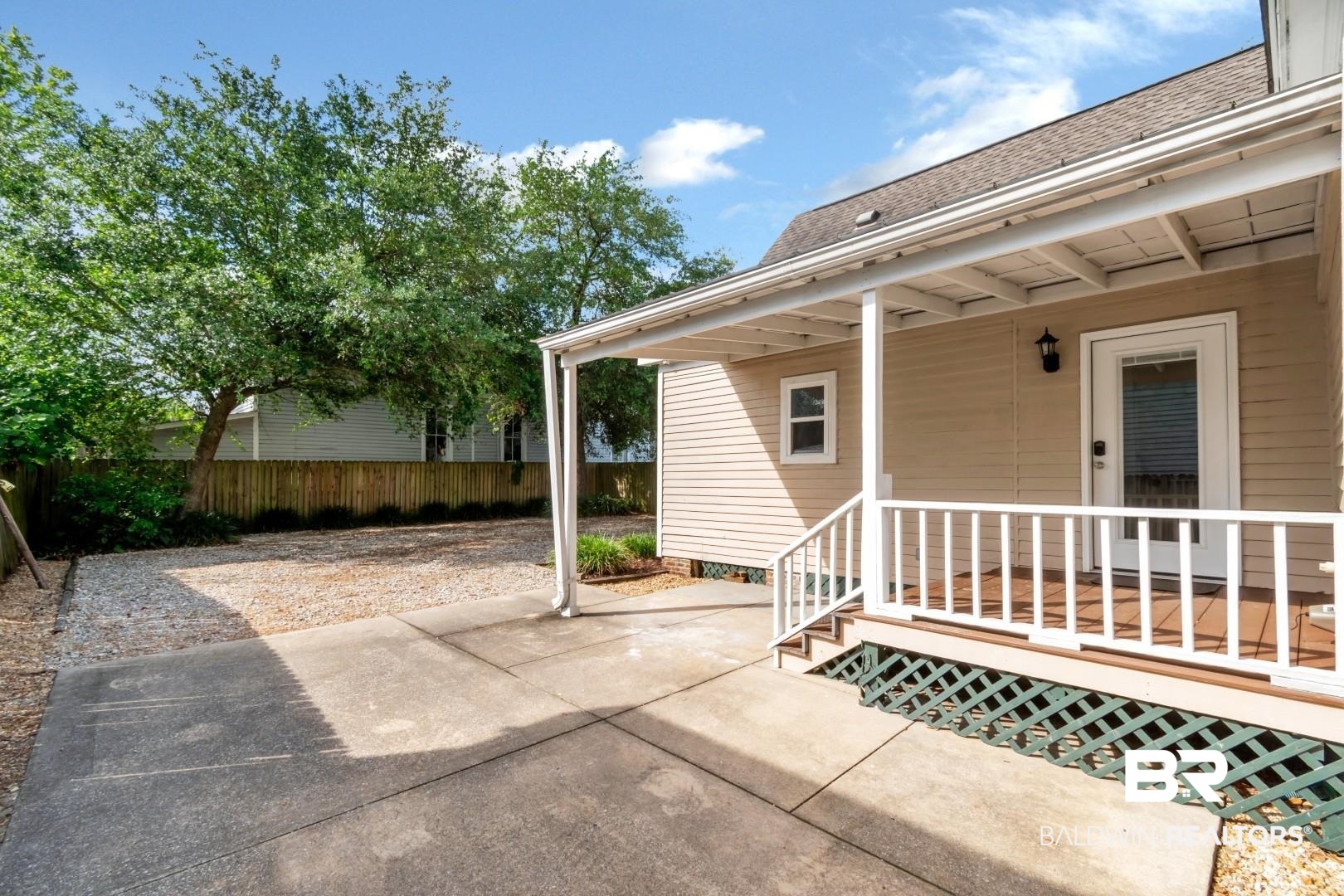 605 St Francis Street Mobile, AL 36602 - Photo 31 of 40 View of patio / terrace featuring fence