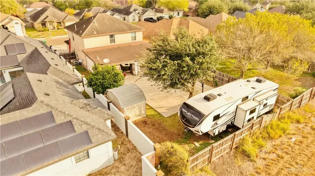 a view of a balcony with a table and chairs