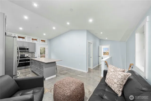 a living room with furniture and a couch