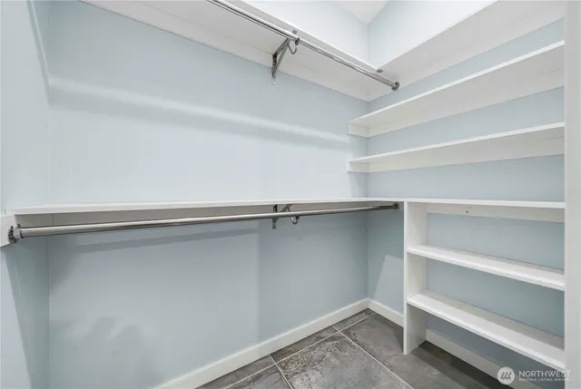 a view of an empty walk in closet