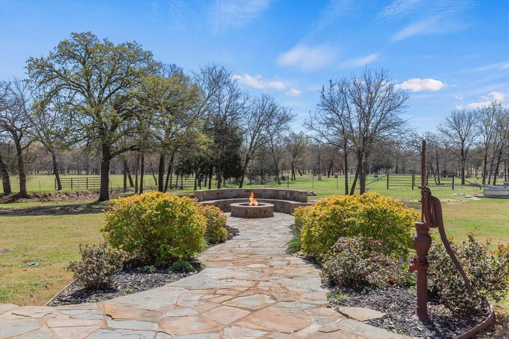8301 Stephens Ranch Road Pilot Point, TX 76258 - Photo 32 of 40 A nice stroll to the of three fire features