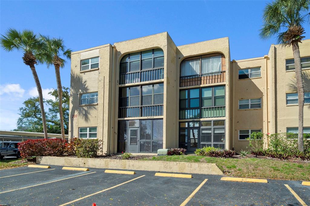 11485 Oakhurst Road, Unit 200208 Largo, FL 33774 - Photo 1 of 25 front view of a building