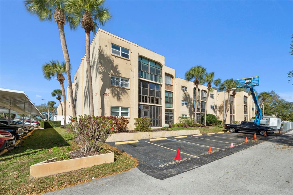 11485 Oakhurst Road, Unit 200208 Largo, FL 33774 - Photo 5 of 25 a view of a building with a street